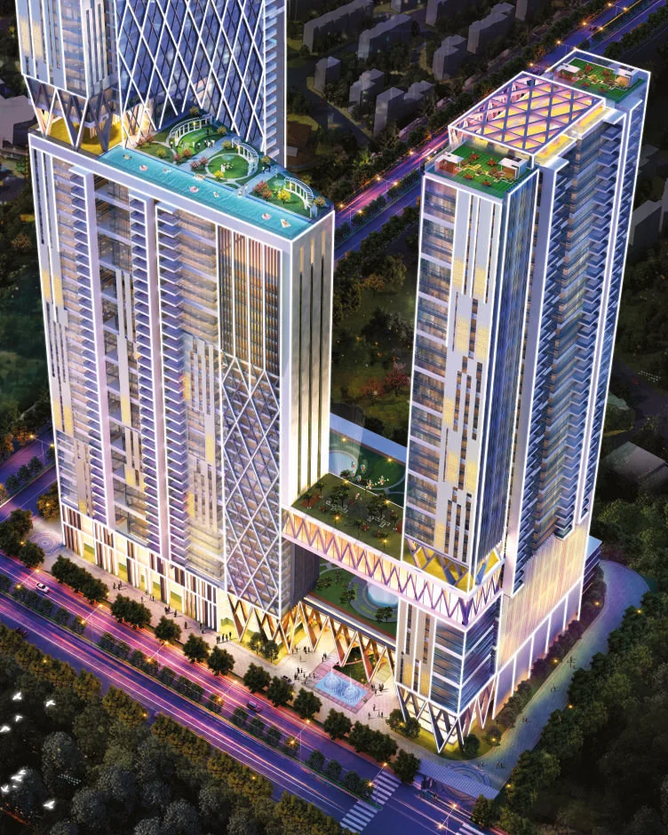 Aerial night view of The Trilight towers and landscaped podium in Kokapet, conceptual elevation